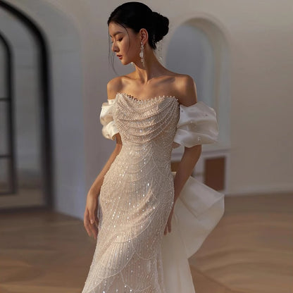 One-shoulder tailored wedding dress